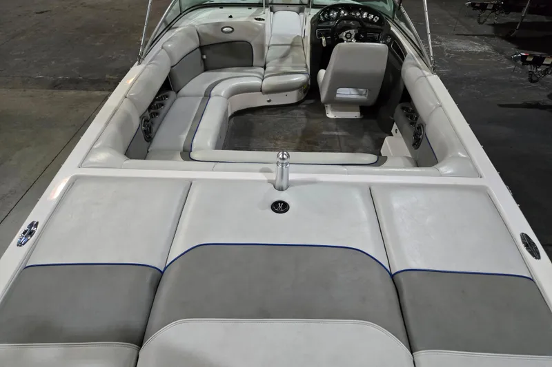 Slide: The Image of 2005 Supra Sunsport 22 V boat interior with spacious seating and sleek design. - 3