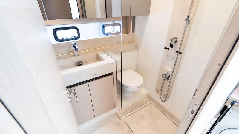 Slide: The Image of Modern bathroom in 2023 Prestige 520S yacht with sleek fixtures and compact design. - 23