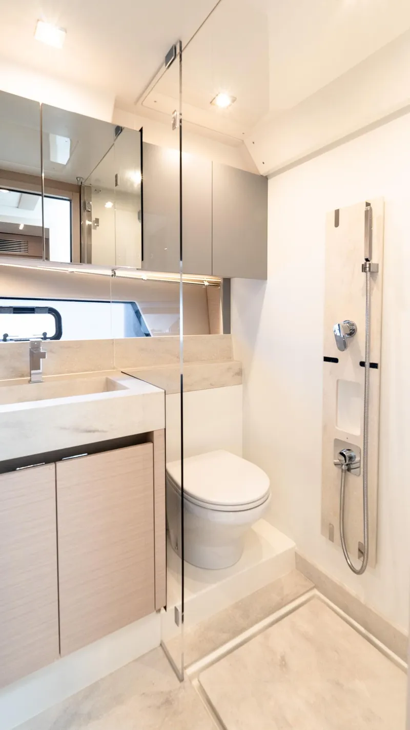 Slide: The Image of Modern bathroom in 2023 Prestige 520S yacht with sleek fixtures and glass shower. - 24