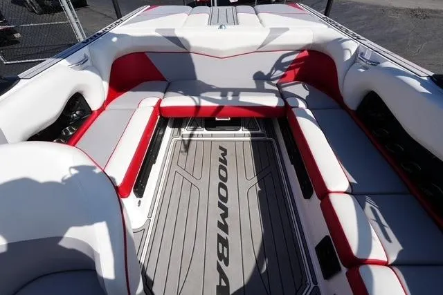 Slide: The Image of 2019 Moomba Craz boat interior with red and white seating, spacious layout. - 15