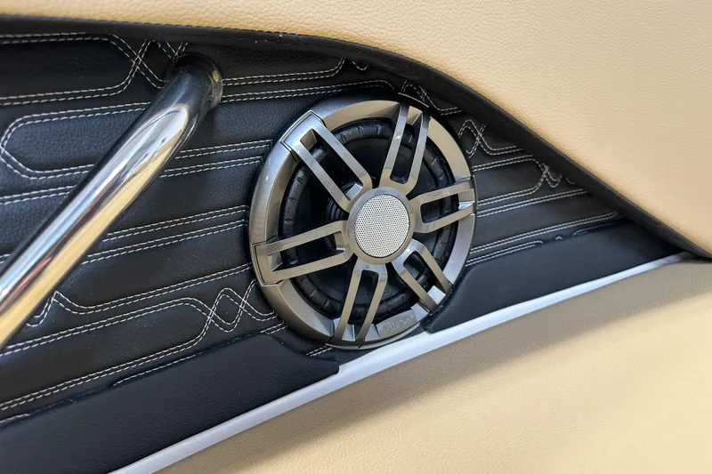 Slide: The Image of Speaker detail in 2026 Sea Ray SPX 210 boat interior with stylish stitching. - 11