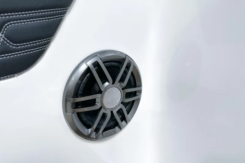 Slide: The Image of Close-up of a speaker on a 2026 Sea Ray SPX 210 boat interior. - 16