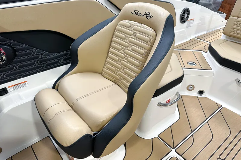 Slide: The Image of 2026 Sea Ray SPX 210 boat seat with beige and black upholstery, luxury design. - 5