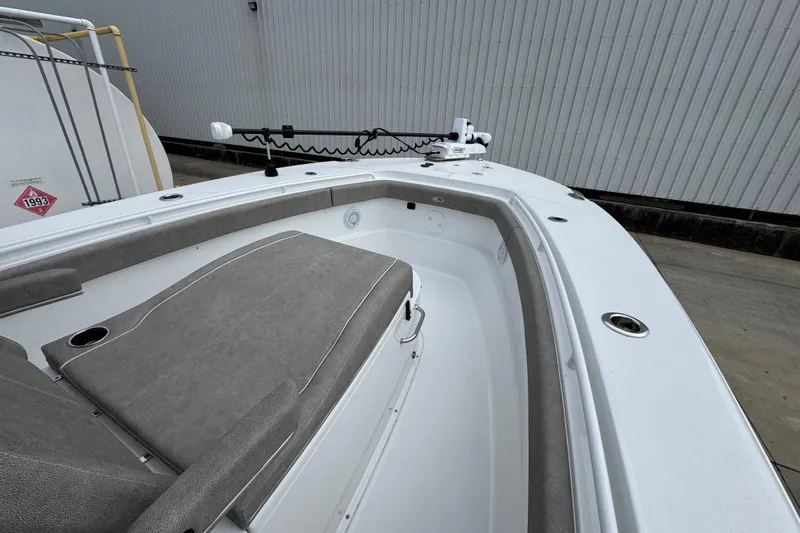 Slide: The Image of 2024 Sea Hunt Gamefish 28 boat interior with cushioned seating and mounted equipment. - 15