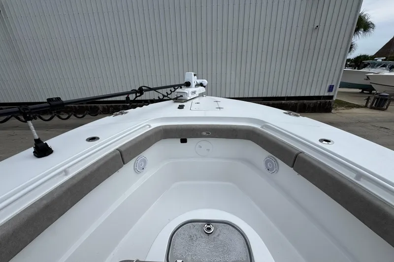 Slide: The Image of 2024 Sea Hunt Gamefish 28 boat interior with seating and fishing equipment. - 16