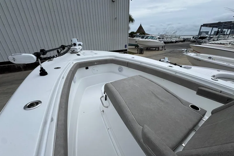 Slide: The Image of 2024 Sea Hunt Gamefish 28 boat interior with seating and fishing equipment. - 17