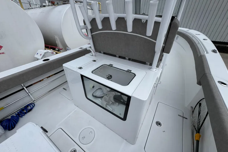 Slide: The Image of 2024 Sea Hunt Gamefish 28 boat interior with storage and seating area. - 33