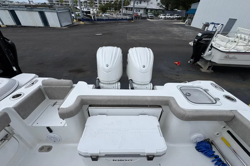 Slide: The Image of 2024 Sea Hunt Gamefish 28 boat with dual engines and spacious deck layout. - 37