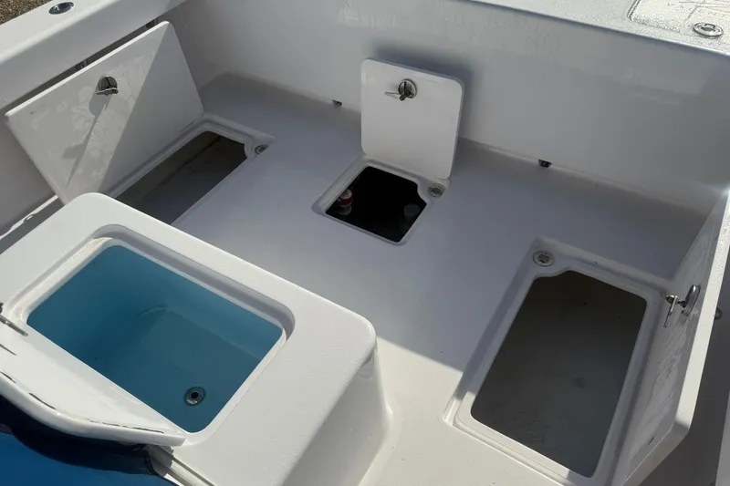 Slide: The Image of Valentino 28CC 2020 boat deck with storage compartments and livewell. - 19
