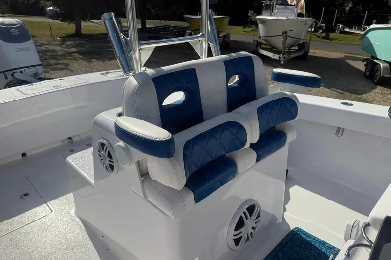 Slide: The Image of Valentino 28CC 2020 boat interior with blue and white seating and speaker system. - 33