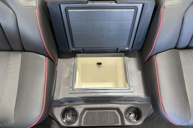Slide: The Image of Interior of 2025 Skeeter ZXR20 boat with open storage compartment. - 8
