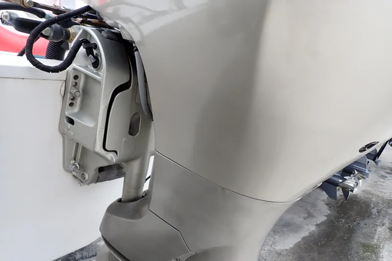 Slide: The Image of 2002 Pro-Line 33 WA boat engine close-up, showcasing motor and propeller details. - 105