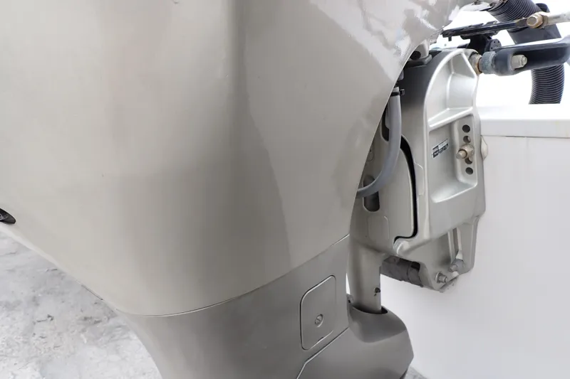 Slide: The Image of 2002 Pro-Line 33 WA boat engine close-up, showcasing motor details and components. - 109