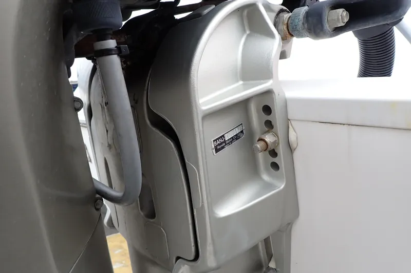 Slide: The Image of Close-up of a 2002 Pro-Line 33 WA boat engine component, showcasing mechanical details. - 117