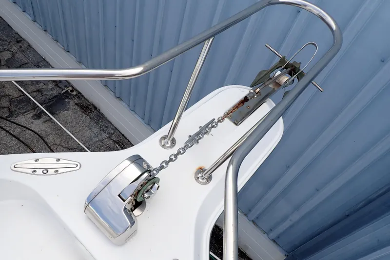 Slide: The Image of Bow of 2002 Pro-Line 33 WA boat with anchor chain and windlass system. - 18