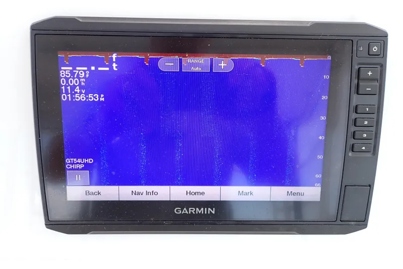Slide: The Image of Garmin fishfinder display on 2002 Pro-Line 33 WA boat, showing sonar data. - 48