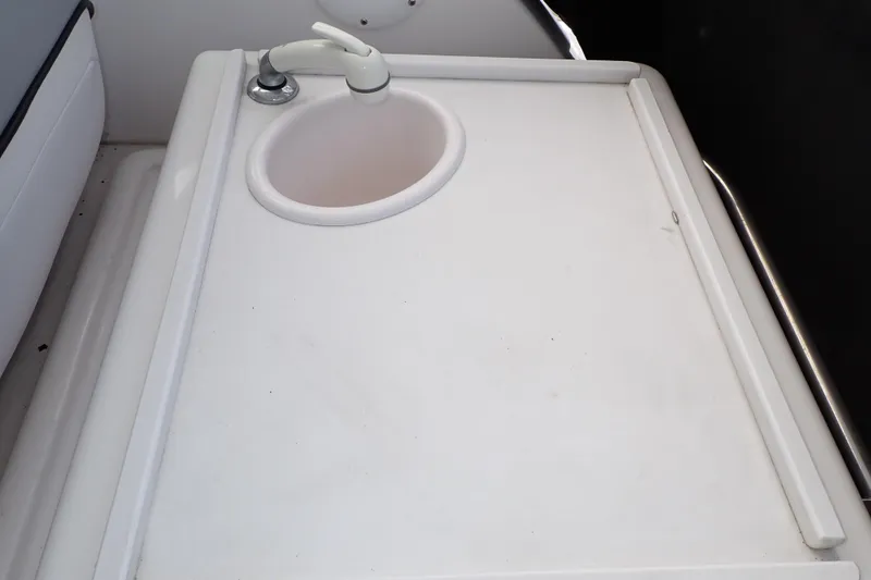Slide: The Image of 2002 Pro-Line 33 WA boat sink and countertop detail. - 59