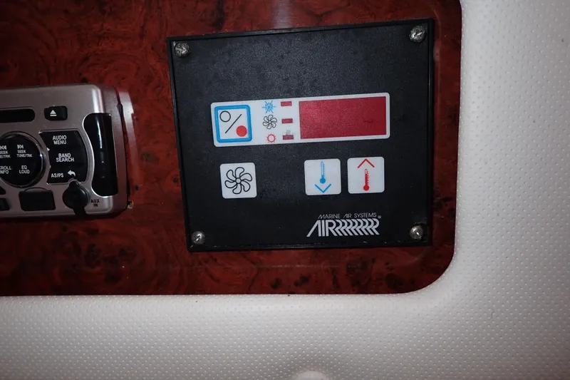Slide: The Image of Control panel of a 2002 Pro-Line 33 WA boat with Marine Air Systems. - 80