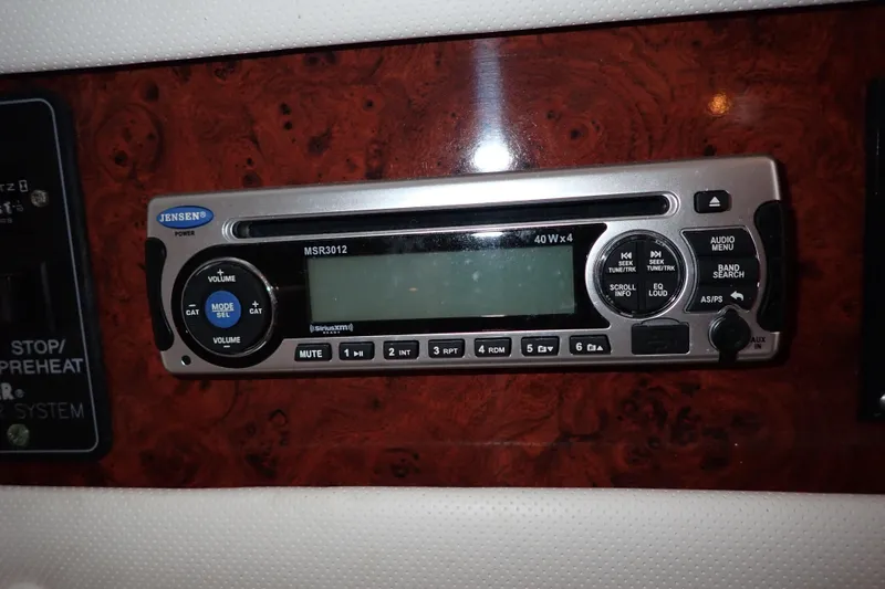 Slide: The Image of Jensen MSR3012 stereo system in 2002 Pro-Line 33 WA boat dashboard. - 81