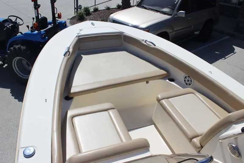 Slide: The Image of 2021 Scout 195 Sport Dorado boat anchor compartment with open hatch. - 16