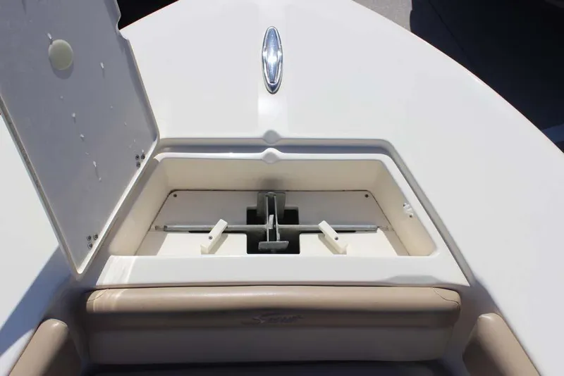 Slide: The Image of 2021 Scout 195 Sport Dorado boat storage compartment with open hatch. - 17