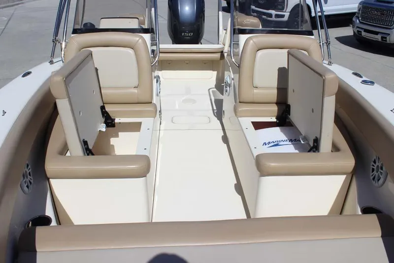 Slide: The Image of 2021 Scout 195 Sport Dorado boat seat with open storage compartment. - 20