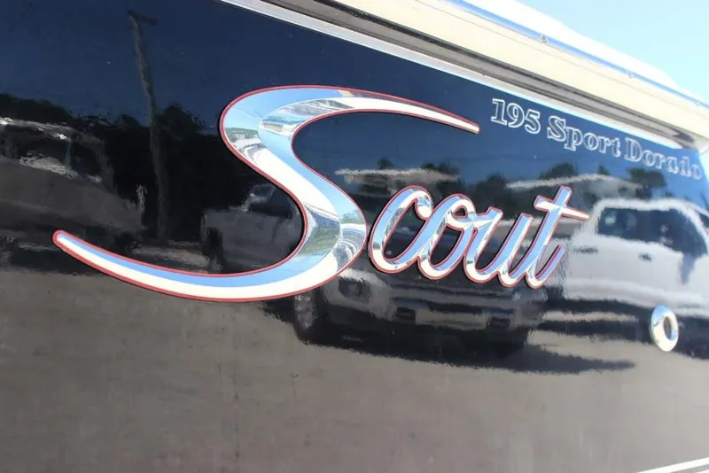 Slide: The Image of 2021 Scout 195 Sport Dorado logo on sleek black surface. - 4
