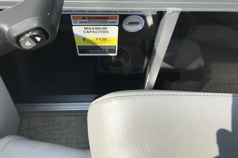 Slide: The Image of 2024 Avalon VENTURE FISH-N-CRUISE boat interior with capacity warning label. - 19