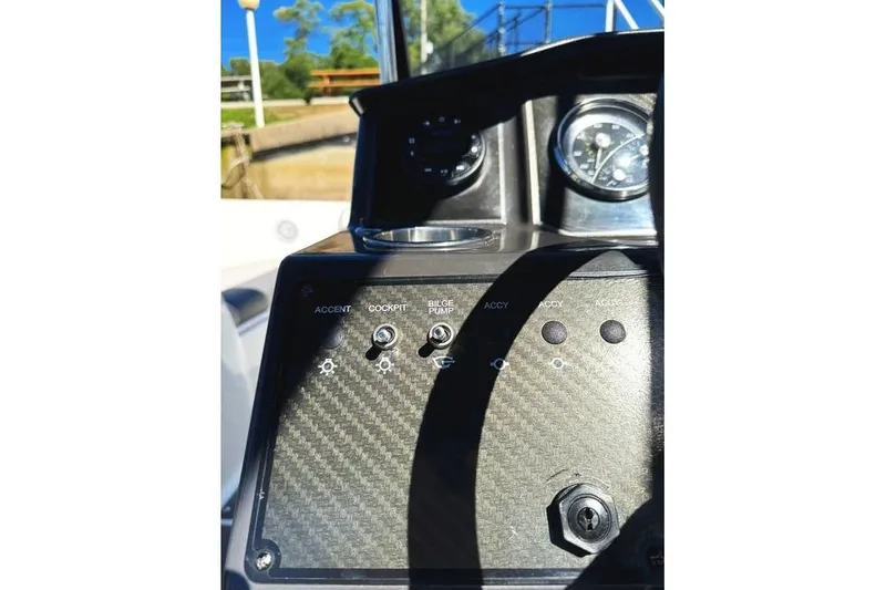 Slide: The Image of 2022 Bayliner VR6 Bowrider OB interior with seating and sleek design. - 8