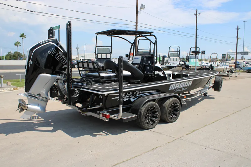 Slide: The Image of 2026 Mamba 227VX boat on trailer, featuring powerful outboard motor and sleek design. - 3