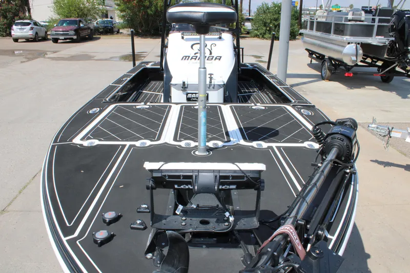 Slide: The Image of 2026 Mamba 227VX boat with sleek black deck and advanced equipment. - 9