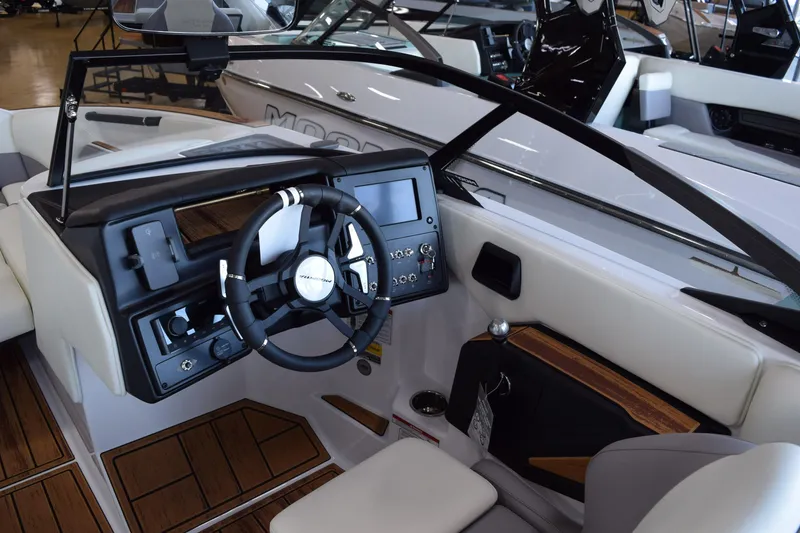 Slide: The Image of 2025 Moomba Craz boat interior with modern dashboard and steering wheel. - 17