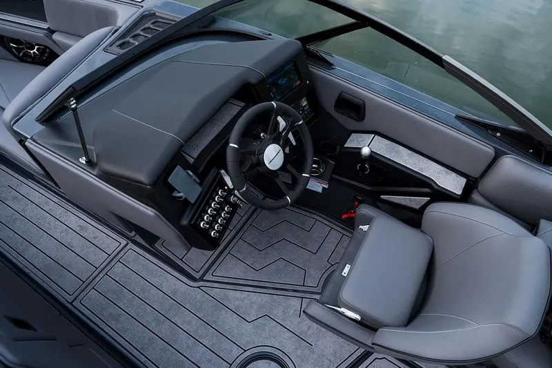 Slide: The Image of Manufacturer Provided Image: 2025 Moomba Craz boat interior with sleek dashboard and modern steering wheel design. - 28