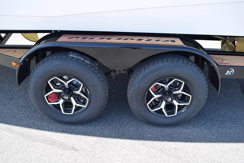Slide: The Image of 2025 Moomba Craz trailer wheels with stylish black and silver rims. - 6