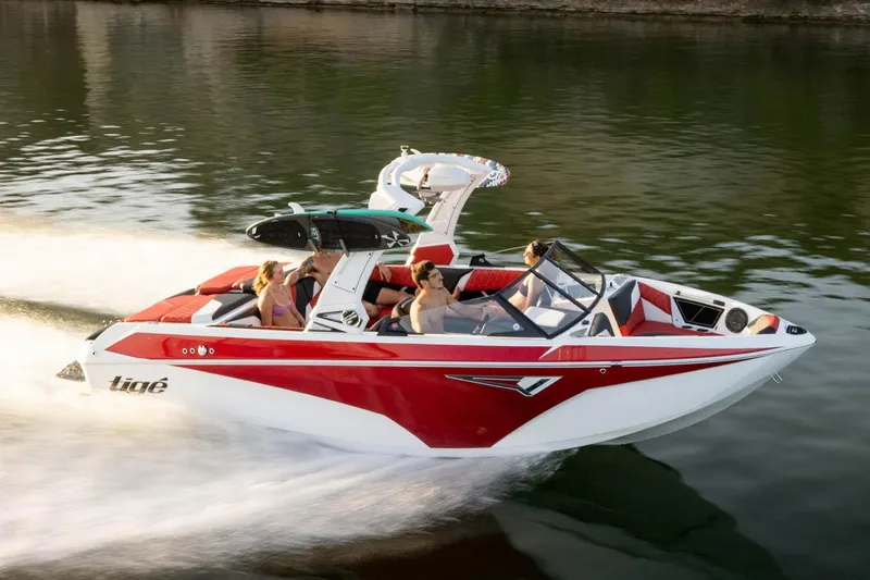 Slide: The Image of Manufacturer Provided Image: 2023 Tigé Z1 boat speeding on water with passengers. - 6