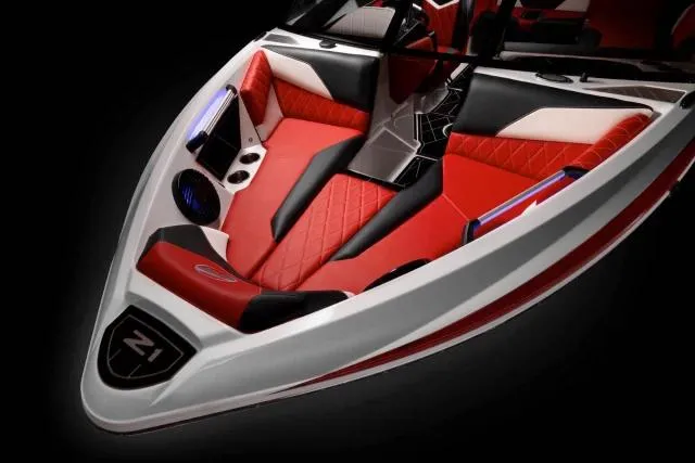 Slide: The Image of Manufacturer Provided Image: 2023 Tigé Z1 boat interior with red and black seating, modern design. - 7
