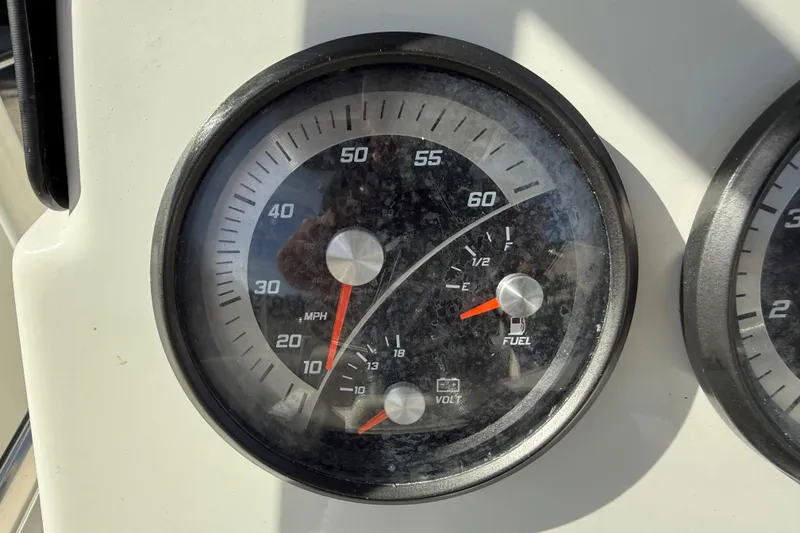 Slide: The Image of Speedometer and fuel gauge of 2022 Bayliner Trophy T18Bay boat dashboard. - 23