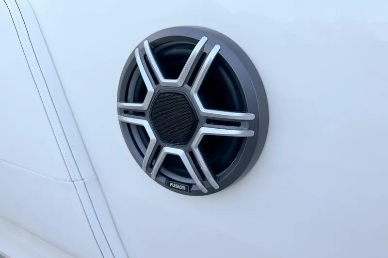 Slide: The Image of Fusion speaker on 2026 Sea Ray Sundancer 320 boat, white interior. - 35