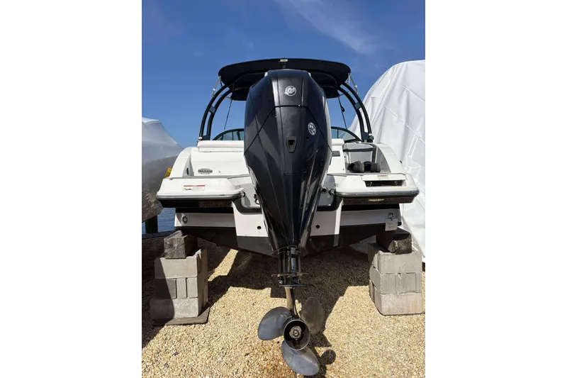 Slide: The Image of 2020 Monterey M-225 boat with outboard motor on dry dock. - 14