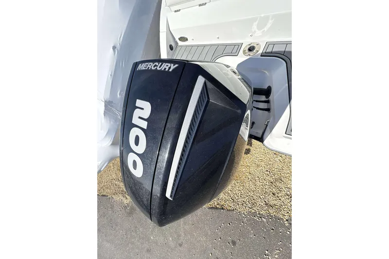 Slide: The Image of Mercury 200 outboard motor on 2020 Monterey M-225 boat, close-up view. - 17
