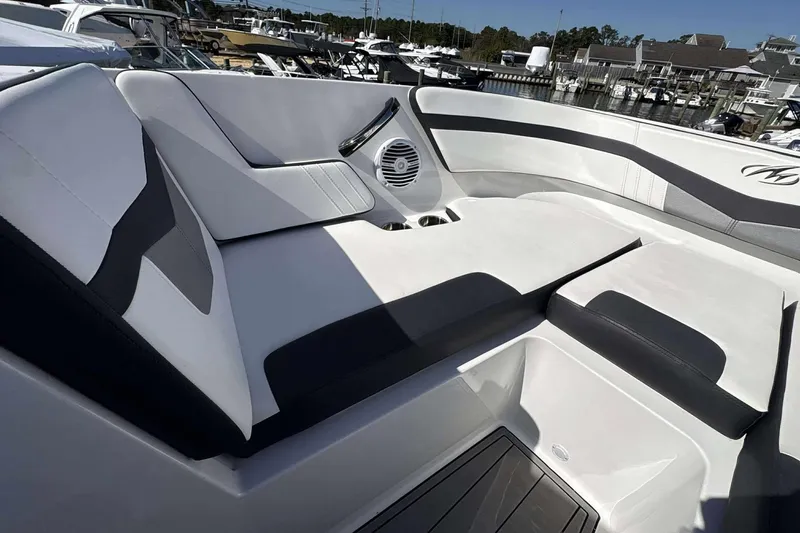 Slide: The Image of Luxurious seating on 2020 Monterey M-225 boat, featuring sleek design and modern amenities. - 7