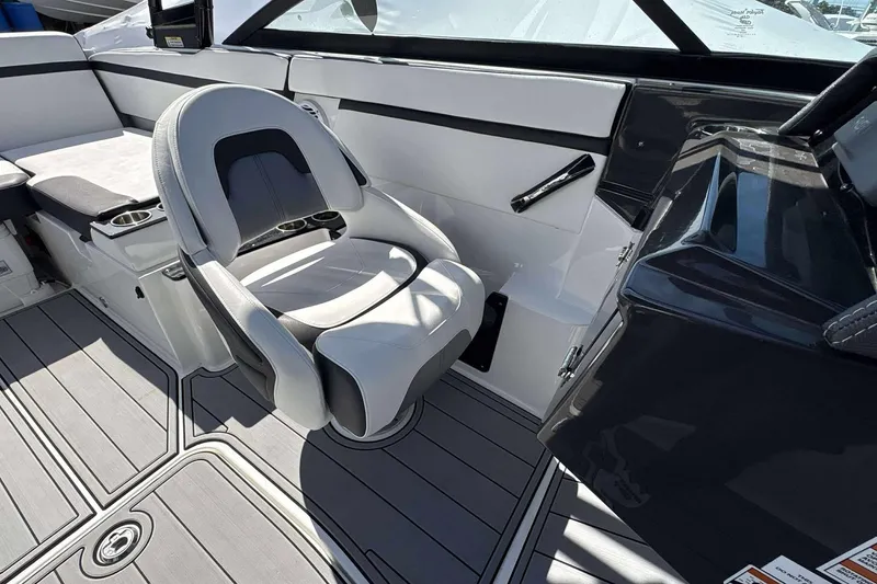 Slide: The Image of 2020 Monterey M-225 boat interior with sleek seating and modern design. - 9
