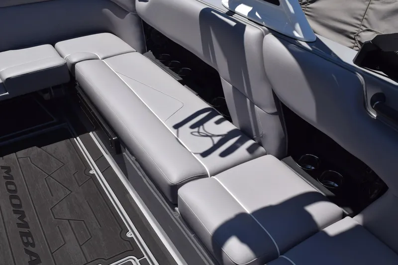 Slide: The Image of 2025 Moomba Tykon interior with sleek gray seating and modern design elements. - 12