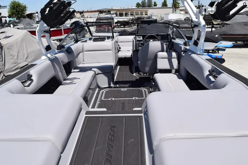 Slide: The Image of 2025 Moomba Tykon boat interior with spacious seating and modern design. - 7