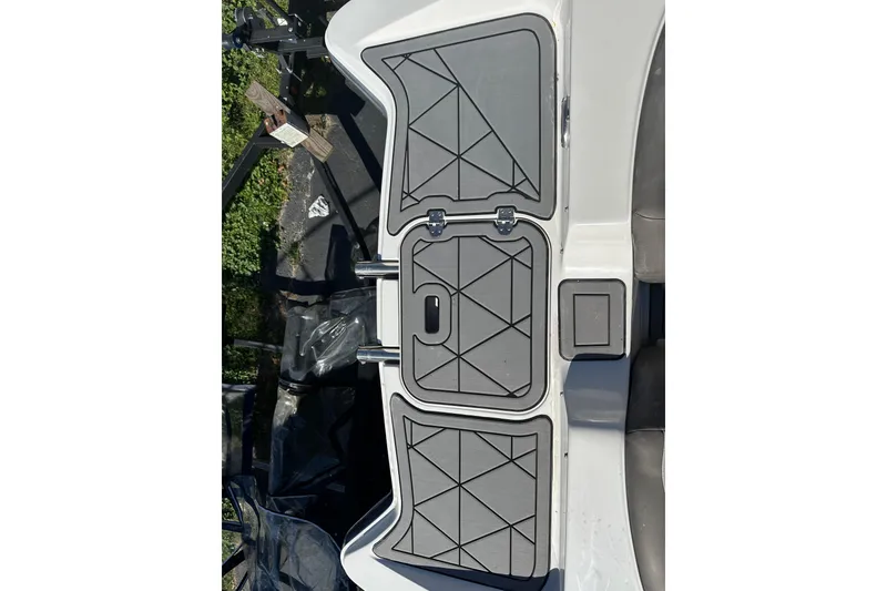 Slide: The Image of 2019 Starcraft Crossover 231 SCX IO SURF boat deck with gray non-slip surface. - 6
