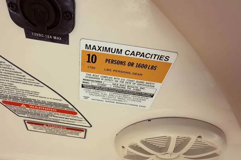 Slide: The Image of Capacity label on 2000 Sea Ray 210 Sundeck, maximum 10 persons or 1600 lbs. - 13