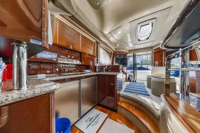 Slide: The Image of Luxurious interior of a 2007 Sea Ray 52 Sedan Bridge yacht with modern amenities. - 30