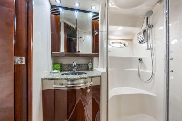 Slide: The Image of Luxurious bathroom in 2007 Sea Ray 52 Sedan Bridge yacht with modern fixtures and elegant design. - 31