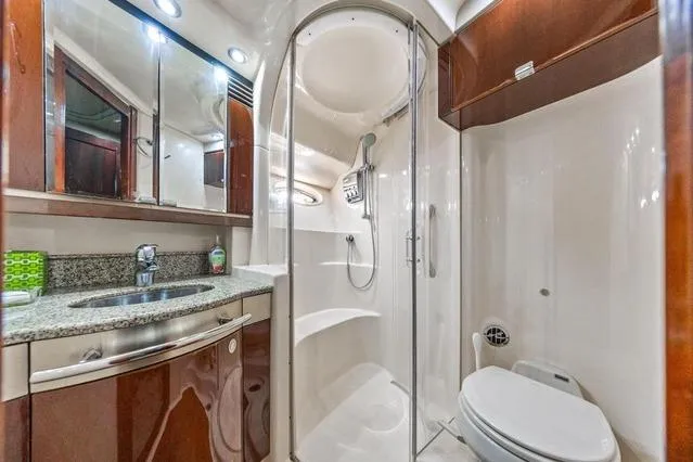 Slide: The Image of Luxurious bathroom in 2007 Sea Ray 52 Sedan Bridge yacht with modern fixtures and elegant design. - 33