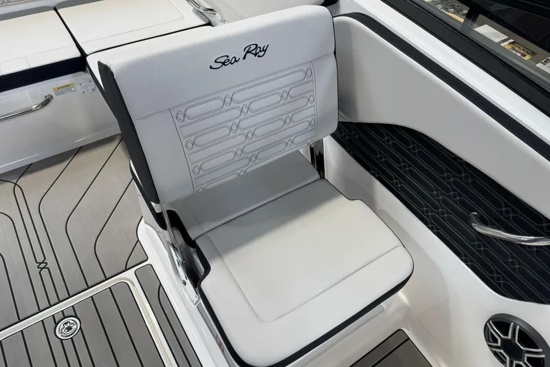 Slide: The Image of 2026 Sea Ray SPX 210 boat interior with stylish seating and modern design. - 15
